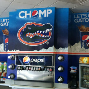 Pepsi and Florida Gators soda machine and wall wrap