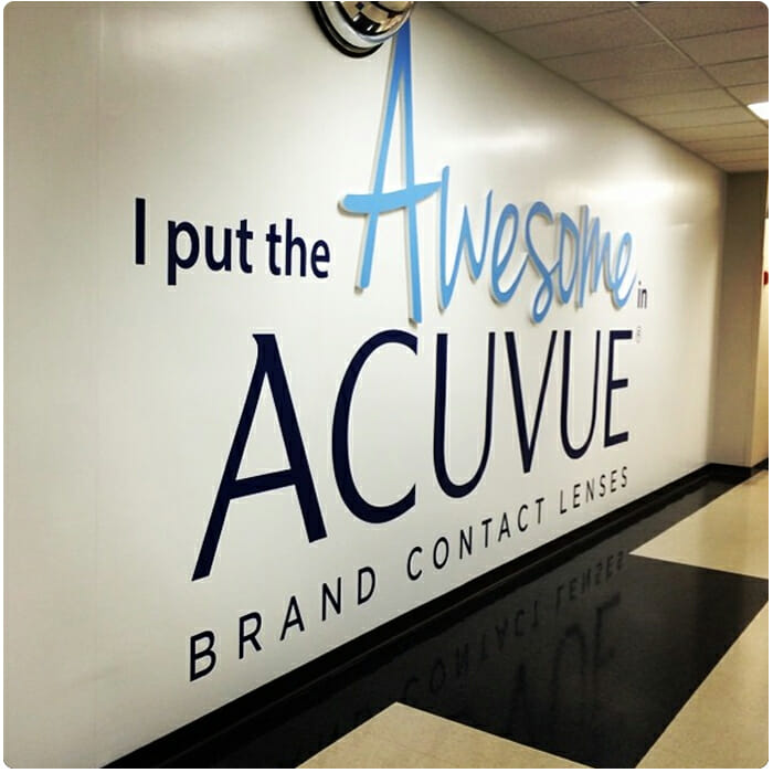 routed foamcore sign letters and vinyl lettering on wall for Acuvue
